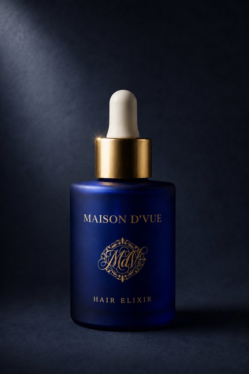 The Signature &mdash; 30ml MAISON D'VUE Hair Elixir in cobalt frosted glass with matte gold cap on a dark studio background